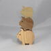 Handmade wooden pig toy, sustainable wood, scroll saw cut, sanded smooth. 1.75", 2", or 2.5" sizes, natural finish for stacking or play.